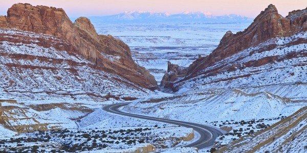 the-interstate-70-which-runs-through-utah-is-most-beautiful-in-winter-especially-when-it-winds-its-way-through-the-snow-covered-spotted-wolf-canyon