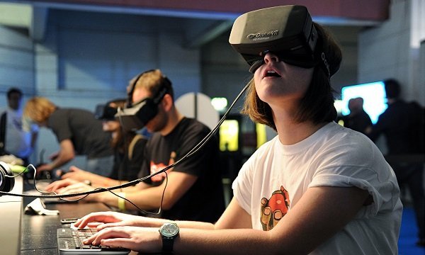 The Oculus Rift headset is tested by attendees at the Eurogamer Expo at Earls Court in London.