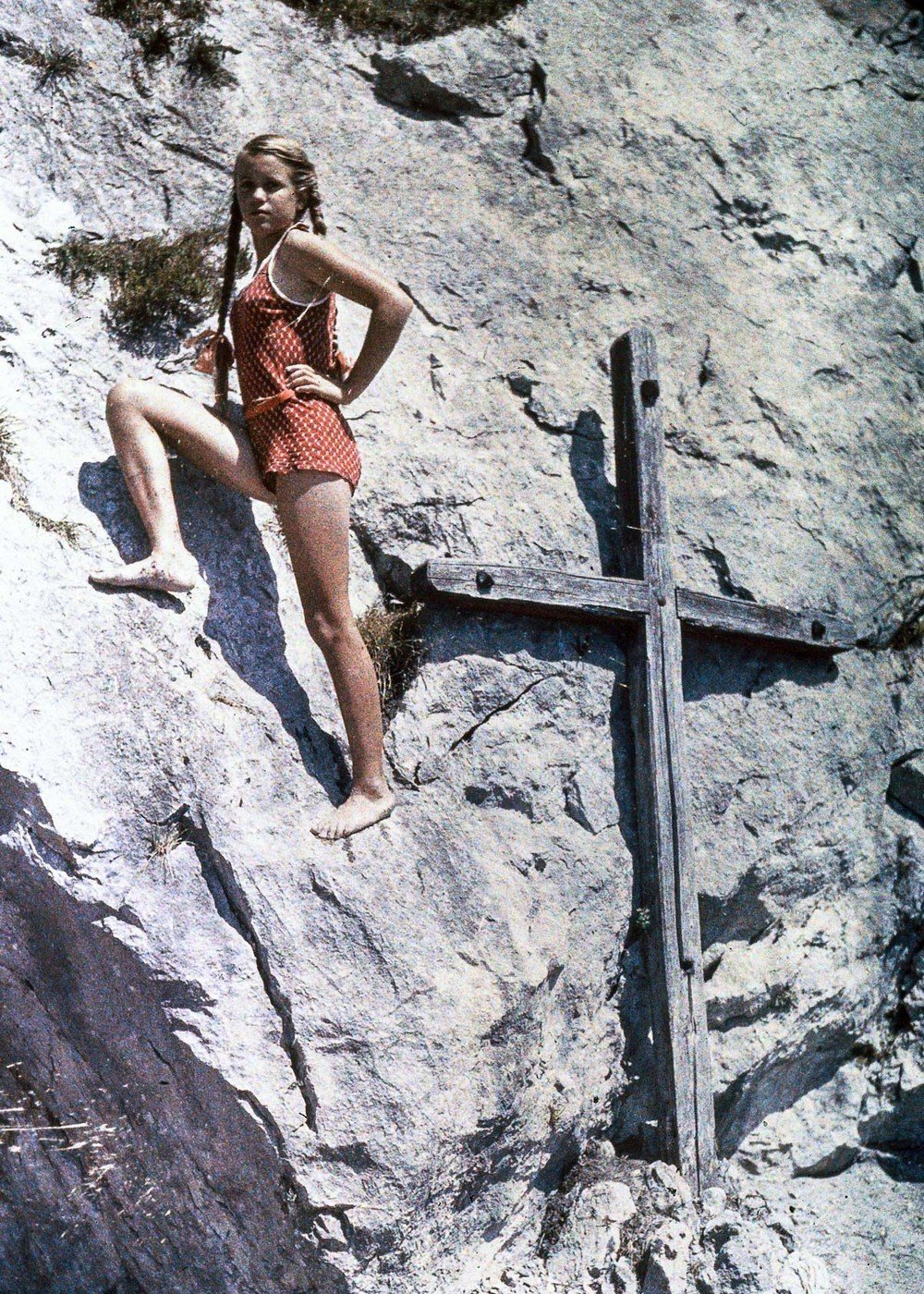 Eva climbing a rock face, Lake Luzern, Switzerland, c 1927.