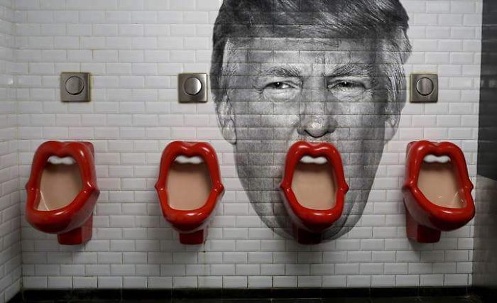 someone-added-donald-trump-to-the-wall-of-this-restroom-in-paris__700