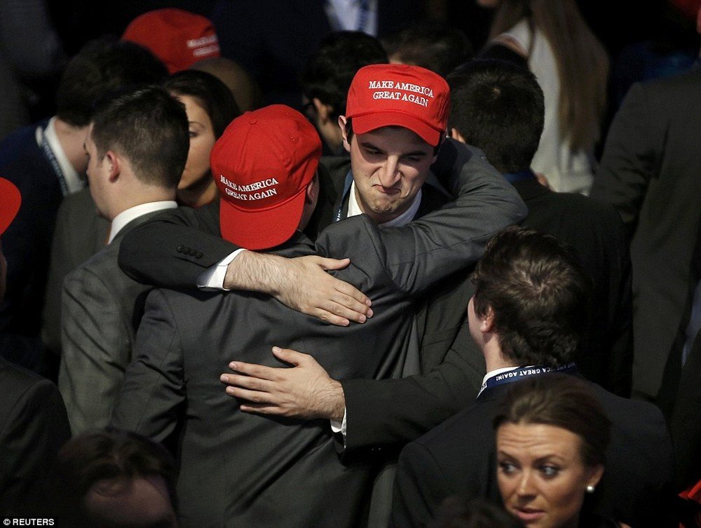 3a31d4a900000578-3918838-bro_force_two_trump_supporters_share_a_happy_hug_as_their_candid-a-10_1478667625513